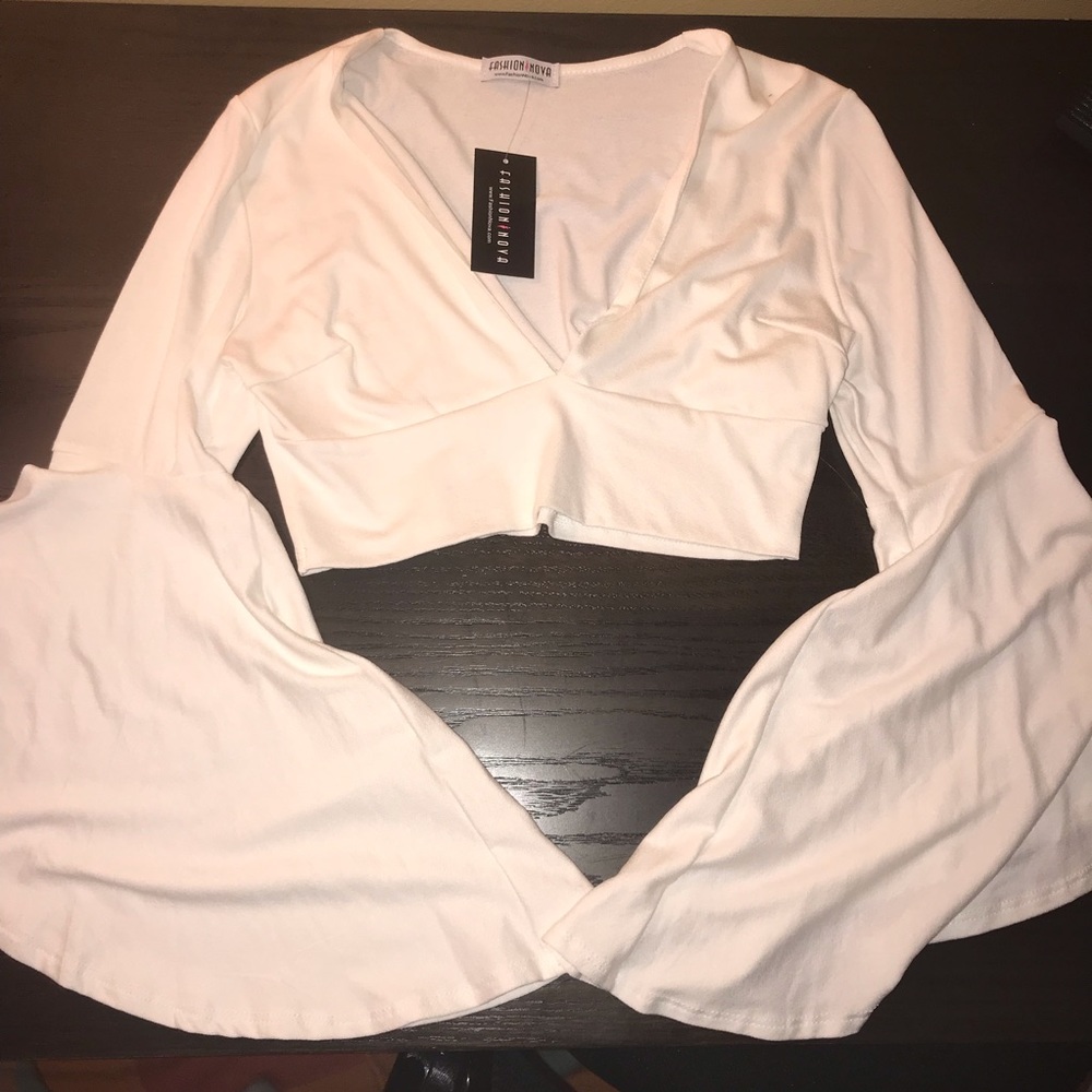 White bell sleeve crop top